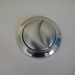 Kohler's new moon/outhouse button.