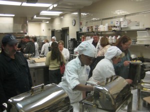 Chefs and farmers in the kitchen on Terra Madre day